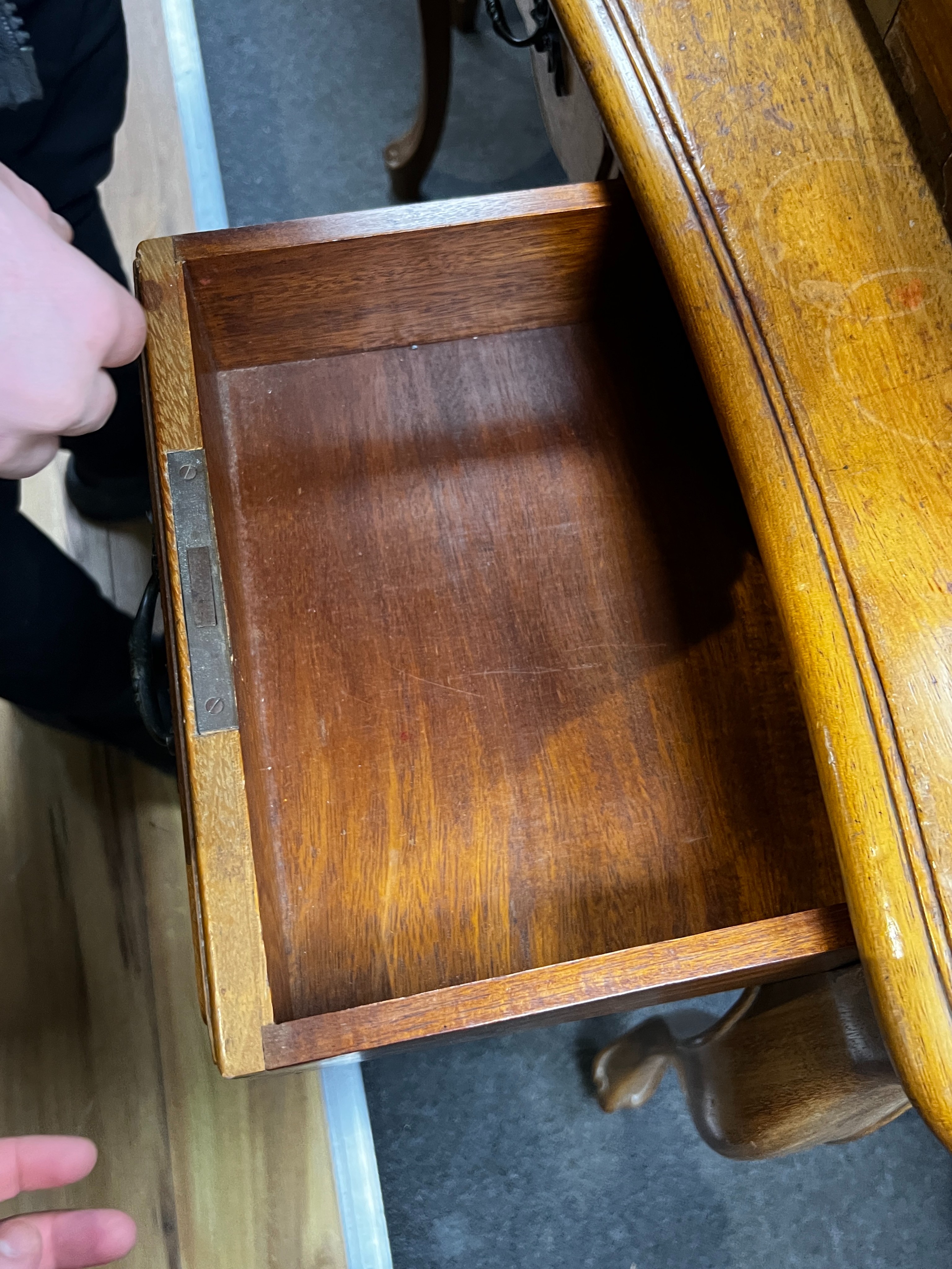 An early 20th century French serpentine three drawer side table, width 108cm, depth 62cm, height 76cm